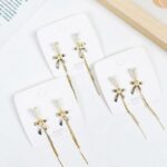 Long Tassel Pearl Bow Earrings - Image 2